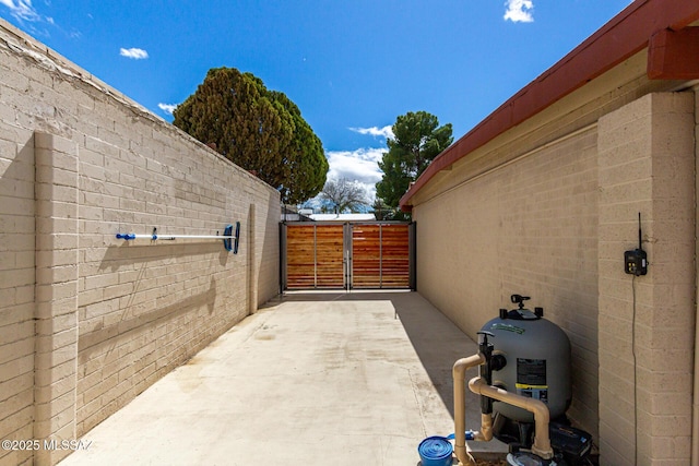 view of side of home with brick siding