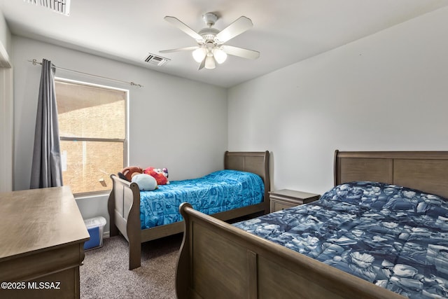 bedroom featuring carpet floors, ceiling fan, and visible vents