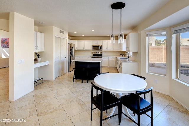 dining area with recessed lighting, visible vents, baseboards, and light tile patterned floors