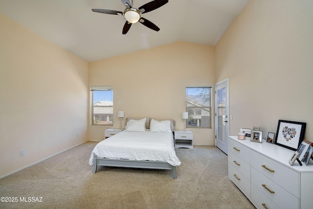 bedroom featuring lofted ceiling, light carpet, ceiling fan, and baseboards