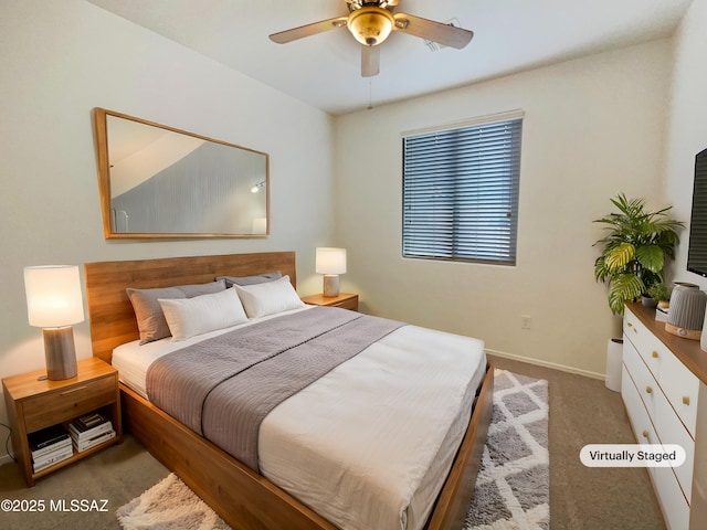 bedroom with carpet floors, baseboards, and a ceiling fan