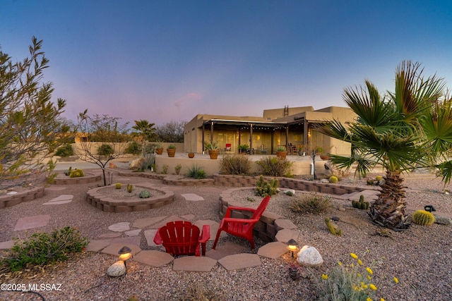 back of property with a patio area