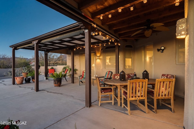 view of patio / terrace featuring outdoor dining area and a ceiling fan