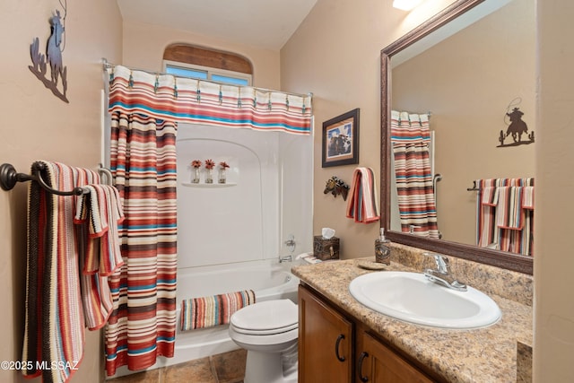 bathroom with toilet, vanity, and shower / bath combo