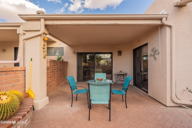 view of patio with outdoor dining space