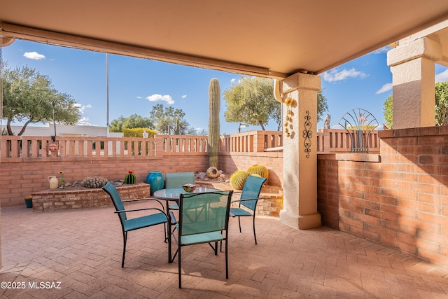 view of patio / terrace with outdoor dining area and a fenced backyard