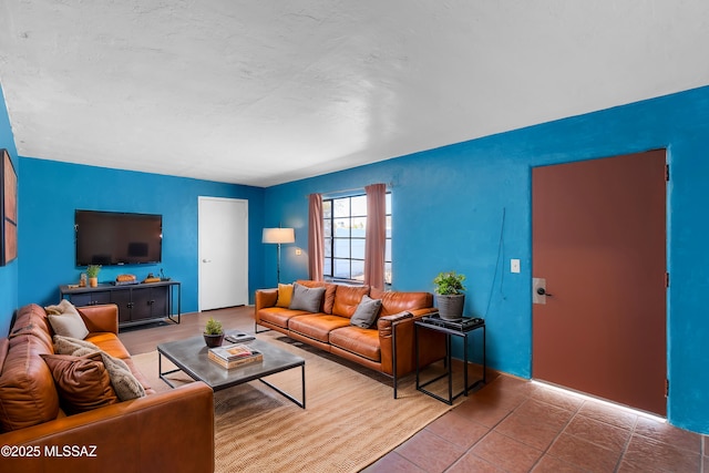 living room featuring tile patterned floors