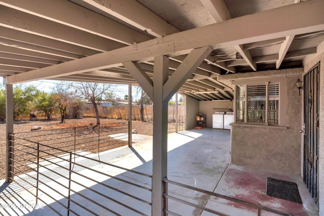 757 W Glenn St, Tucson, AZ 85705 - view of patio / terrace featuring independent washer and dryer
