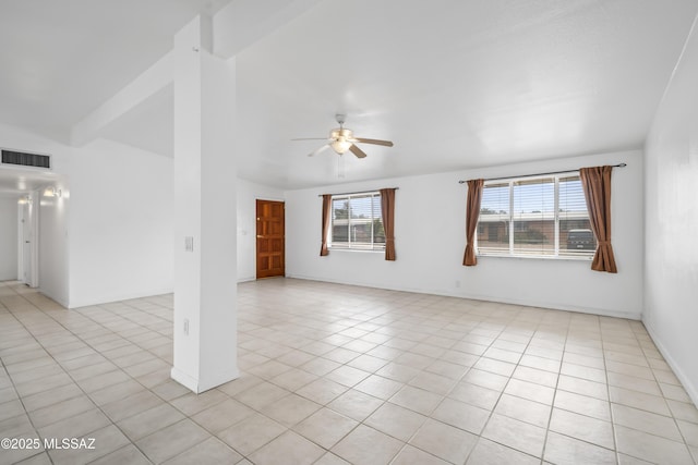 spare room featuring light tile patterned floors, baseboards, visible vents, and a ceiling fan