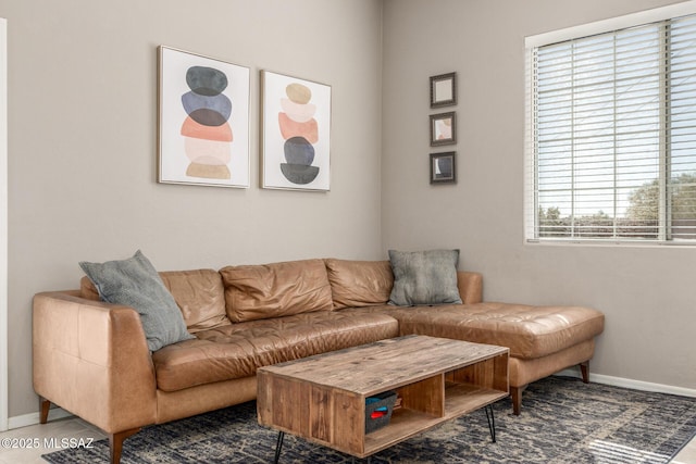 living room featuring baseboards