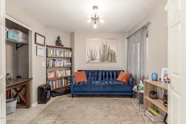 living area with a notable chandelier