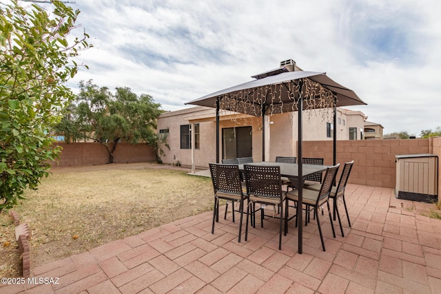 view of patio / terrace with a fenced backyard and outdoor dining area