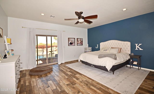 bedroom featuring baseboards, visible vents, wood finished floors, access to exterior, and recessed lighting