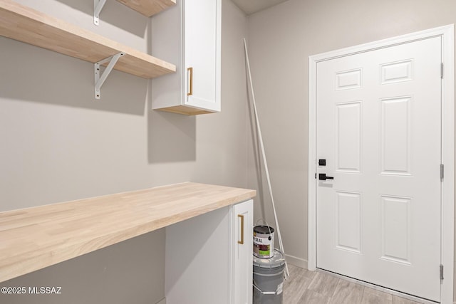 washroom with light wood-style flooring