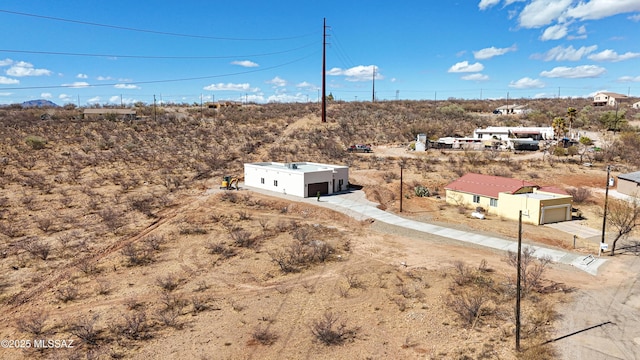 drone / aerial view featuring view of desert