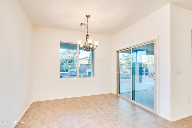 1091 E Empire Canyon Ln, Sahuarita, AZ 85629 - spare room featuring a chandelier, a healthy amount of sunlight, visible vents, and baseboards