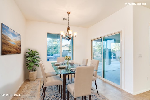 1091 E Empire Canyon Ln, Sahuarita, AZ 85629 - dining space featuring baseboards, visible vents, and a chandelier