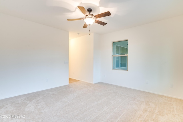 1091 E Empire Canyon Ln, Sahuarita, AZ 85629 - empty room with light carpet, ceiling fan, and baseboards