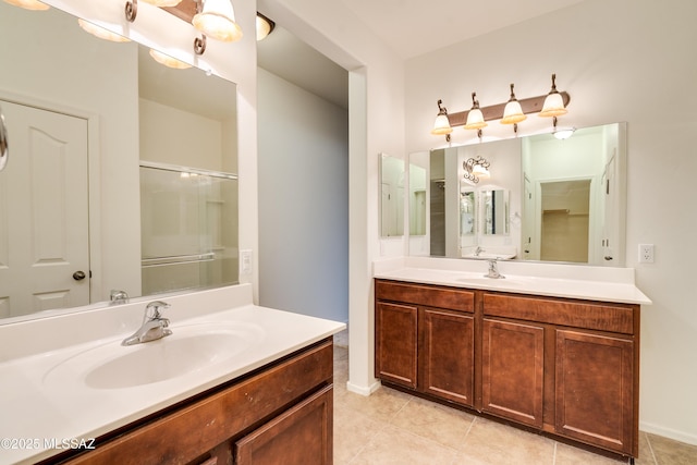1091 E Empire Canyon Ln, Sahuarita, AZ 85629 - bathroom featuring two vanities, a sink, and tile patterned floors