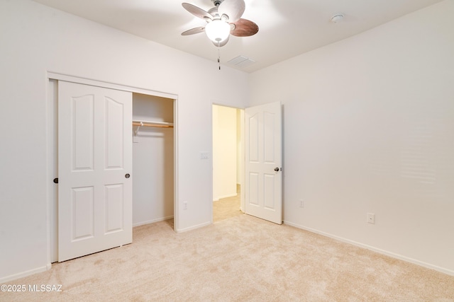 1091 E Empire Canyon Ln, Sahuarita, AZ 85629 - unfurnished bedroom with baseboards, a closet, visible vents, and carpet flooring