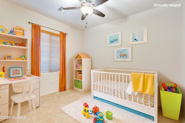 1091 E Empire Canyon Ln, Sahuarita, AZ 85629 - bedroom featuring a nursery area, carpet floors, ceiling fan, and visible vents