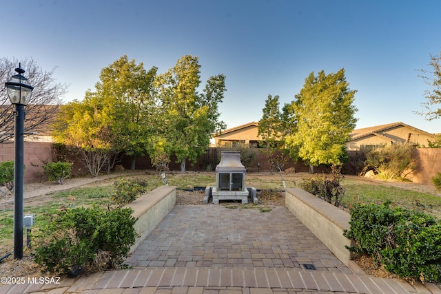1091 E Empire Canyon Ln, Sahuarita, AZ 85629 - exterior space with a fenced backyard and a patio