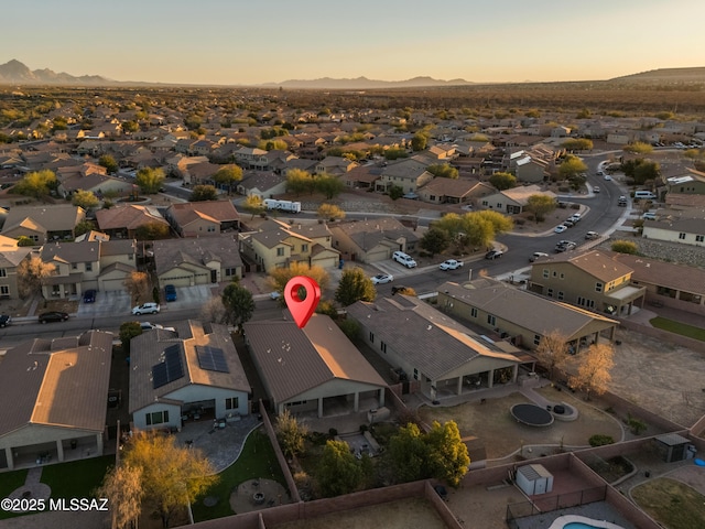 1091 E Empire Canyon Ln, Sahuarita, AZ 85629 - aerial view at dusk with a residential view