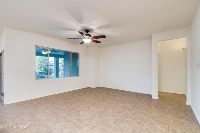 1091 E Empire Canyon Ln, Sahuarita, AZ 85629 - unfurnished room with a ceiling fan and baseboards