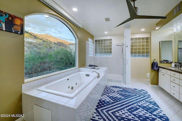 full bath with vanity, a tub with jets, visible vents, a stall shower, and tile patterned flooring