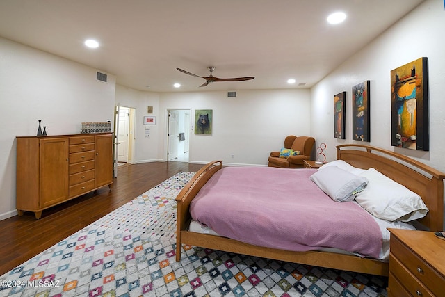 bedroom with dark wood finished floors, visible vents, recessed lighting, and ceiling fan