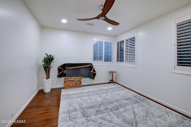 sitting room featuring recessed lighting, baseboards, wood finished floors, and a ceiling fan