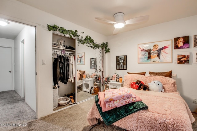 carpeted bedroom with a ceiling fan and a closet