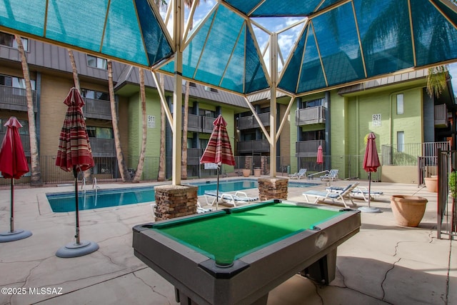 rec room with pool table and a swimming pool