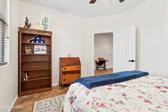 bedroom with visible vents, ceiling fan, and baseboards