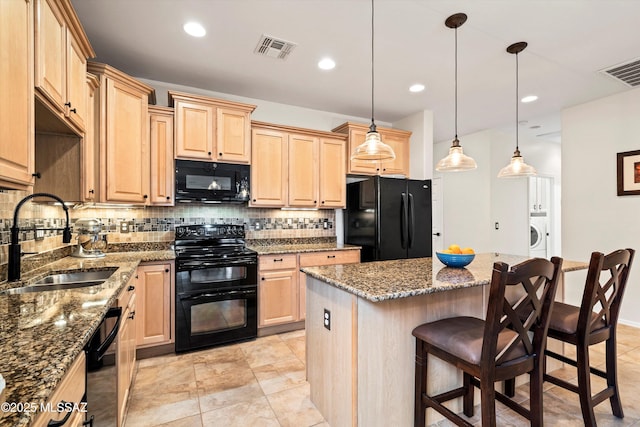 kitchen with light brown cabinets, a sink, visible vents, decorative backsplash, and black appliances