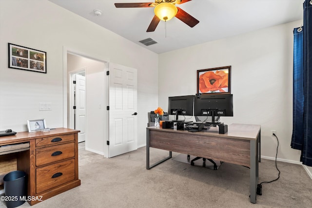 office with light carpet, ceiling fan, visible vents, and baseboards