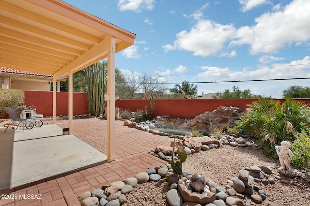 view of patio featuring a fenced backyard