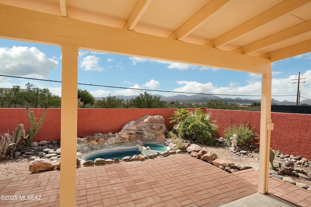 view of patio featuring a fenced backyard