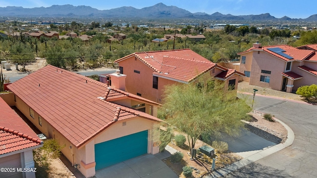 aerial view with a residential view and a mountain view