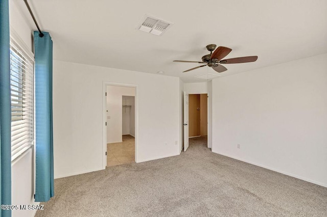 60579 E Flank Strap Dr, Tucson, AZ 85739 - unfurnished bedroom with carpet flooring, visible vents, and a ceiling fan