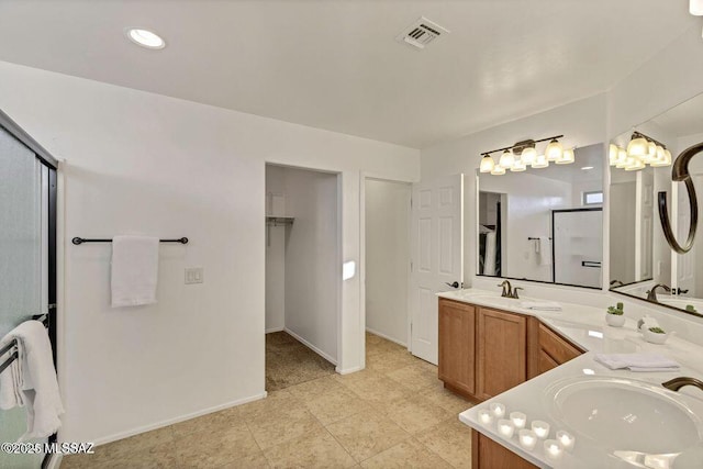 60579 E Flank Strap Dr, Tucson, AZ 85739 - full bath with double vanity, baseboards, visible vents, and a sink