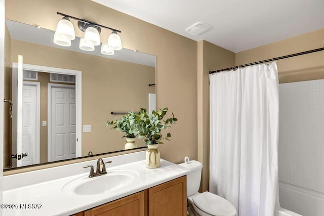 60579 E Flank Strap Dr, Tucson, AZ 85739 - full bathroom with shower / bath combo, visible vents, vanity, and toilet