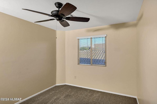 60579 E Flank Strap Dr, Tucson, AZ 85739 - unfurnished room with a ceiling fan, dark colored carpet, and baseboards