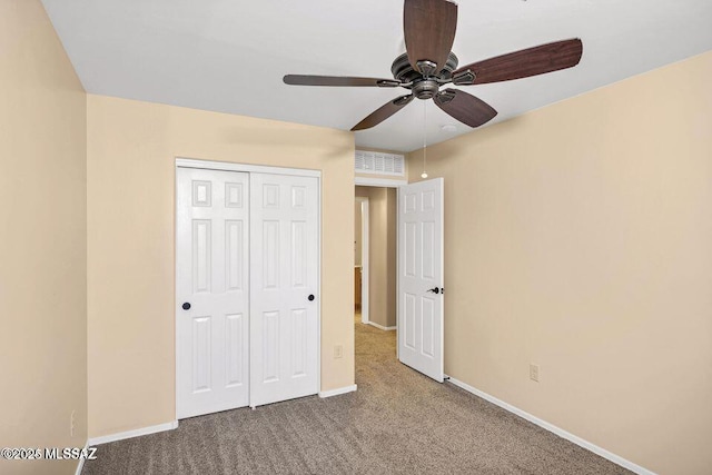 60579 E Flank Strap Dr, Tucson, AZ 85739 - unfurnished bedroom with carpet floors, visible vents, baseboards, and a closet