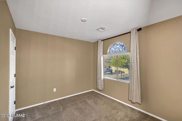 60579 E Flank Strap Dr, Tucson, AZ 85739 - carpeted empty room with visible vents and baseboards