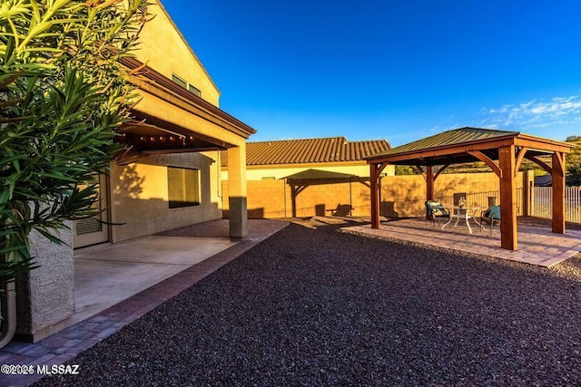 60579 E Flank Strap Dr, Tucson, AZ 85739 - view of patio with a gazebo and fence
