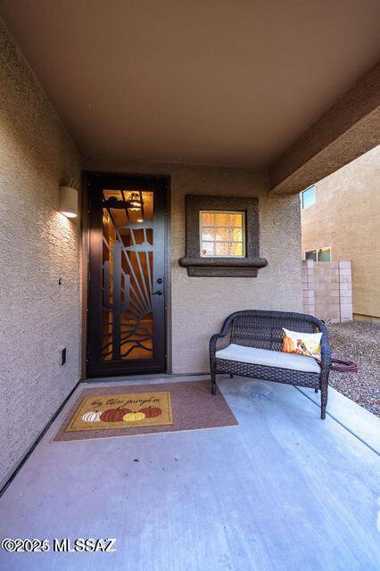 60579 E Flank Strap Dr, Tucson, AZ 85739 - property entrance featuring stucco siding