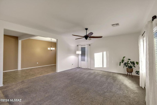 60579 E Flank Strap Dr, Tucson, AZ 85739 - carpeted empty room featuring visible vents and ceiling fan with notable chandelier