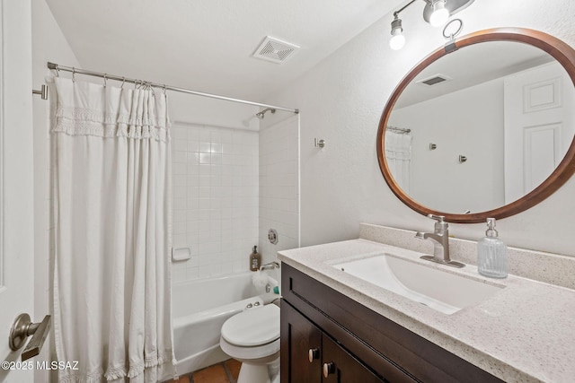 bathroom with visible vents, toilet, shower / bath combo, and vanity