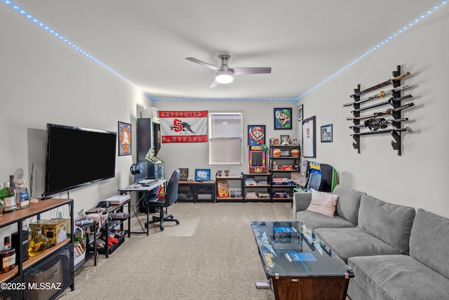 carpeted living room featuring a ceiling fan